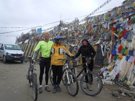 Prayer flags and friends atop a Himalayan peak, 2012