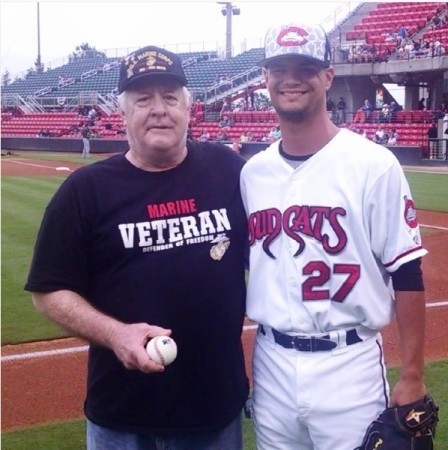 Throwing out first pitch to grandson Nick