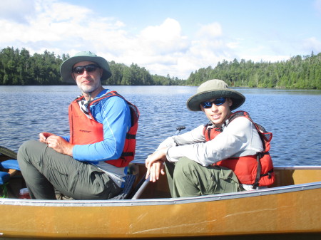 Erik and Owen canoeing in Canada