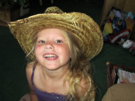 Grandaughter Mia in G-ma Karen Cowboy hat.