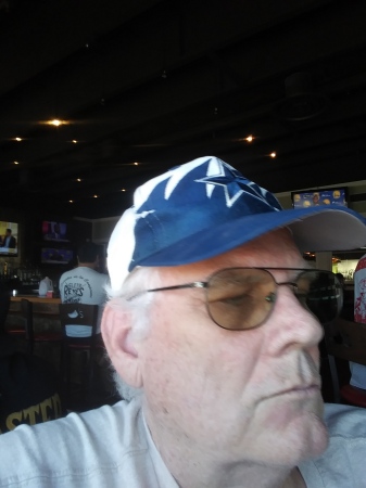 Wearing my son's hat at Chili's