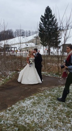 Her wedding day picture at a ski resort 