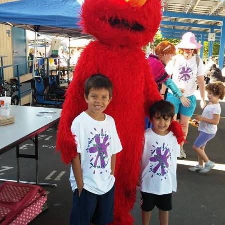 My two grandsons with Elmo
