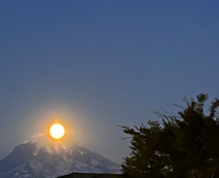 Moon rising over Mout Rainier