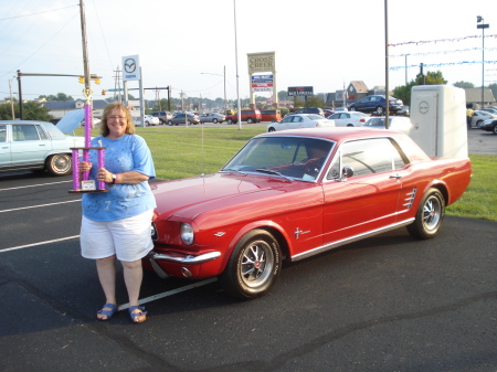 Diane with her first car that we finally resto