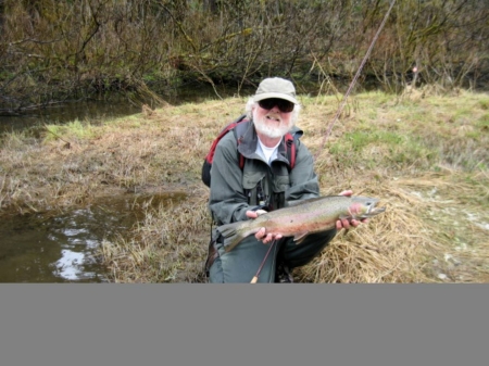 My Brother Skip with a huge rainbow trout caught in Northern California 