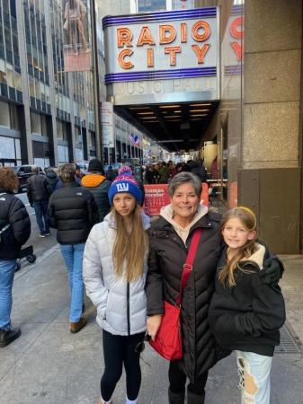 Chris with granddaughters radio city