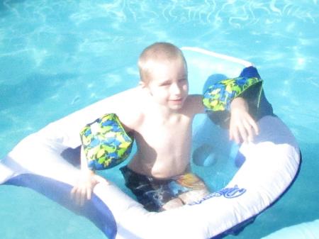 Bobby our Grandson 5 in our pool