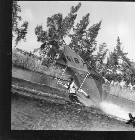 CIRCA 1967:  Norman flying a kite 