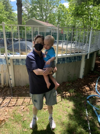 Tommy by the pool with Aunt Mel.