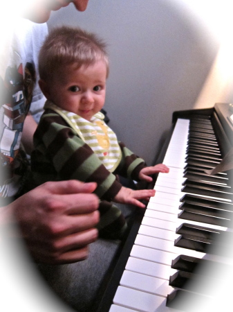 Caleb my newest grandson 1st piano lesson