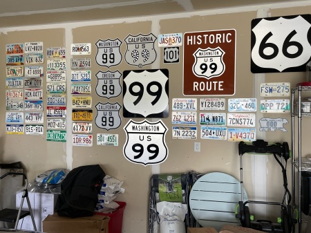 My collection of car plates and US 99 signs