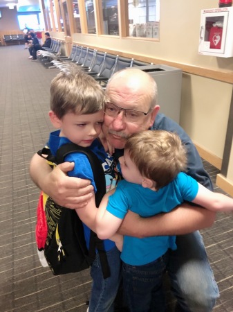 Getting hugs as they arrive at airport.