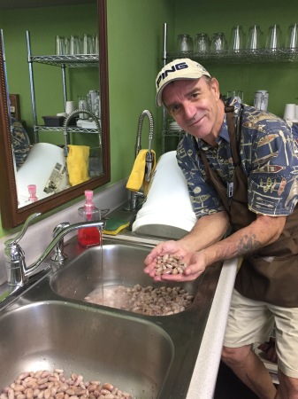 Rinsing cacao ready to dry