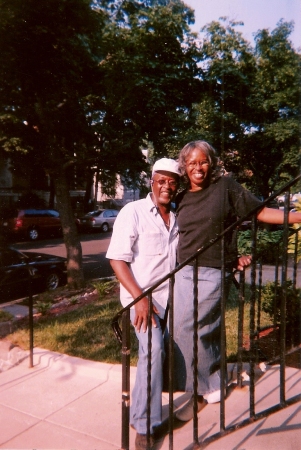 wife and i in front of my fathers house