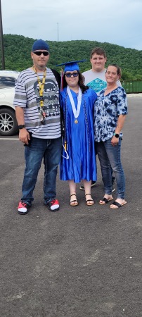 My family the day Angel graduated May 2022