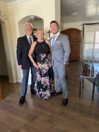 All dressed up for a wedding! Mom Dad Son 