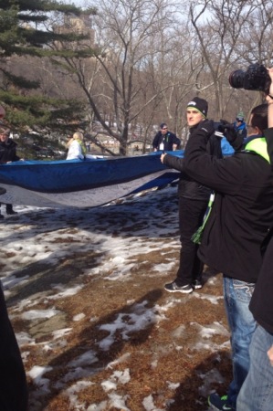 Sean signing the flag