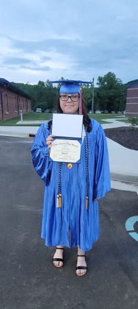 Angel wit her diploma 2022