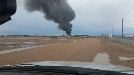 Oil well.on fire SE of Greeley