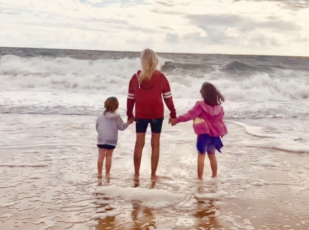 Ellen and grandkids on the beach at Rehoboth