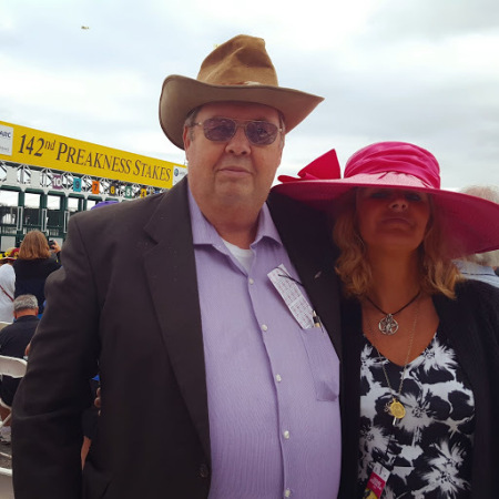 At the horse races with wife