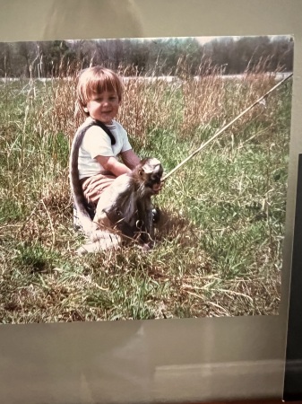 Jamie fishing with his monkey friend 