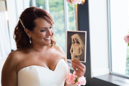 Bride Sara w/ photo of me 1 million yrs ago