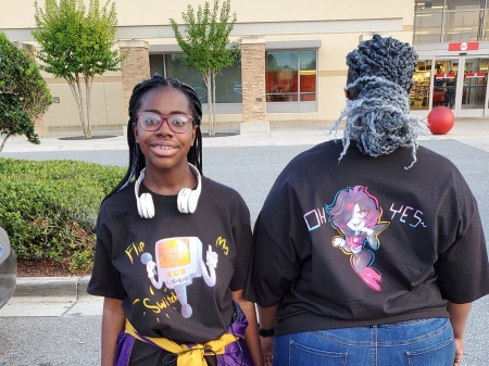 My baby girl and I showing off her t-shirt art