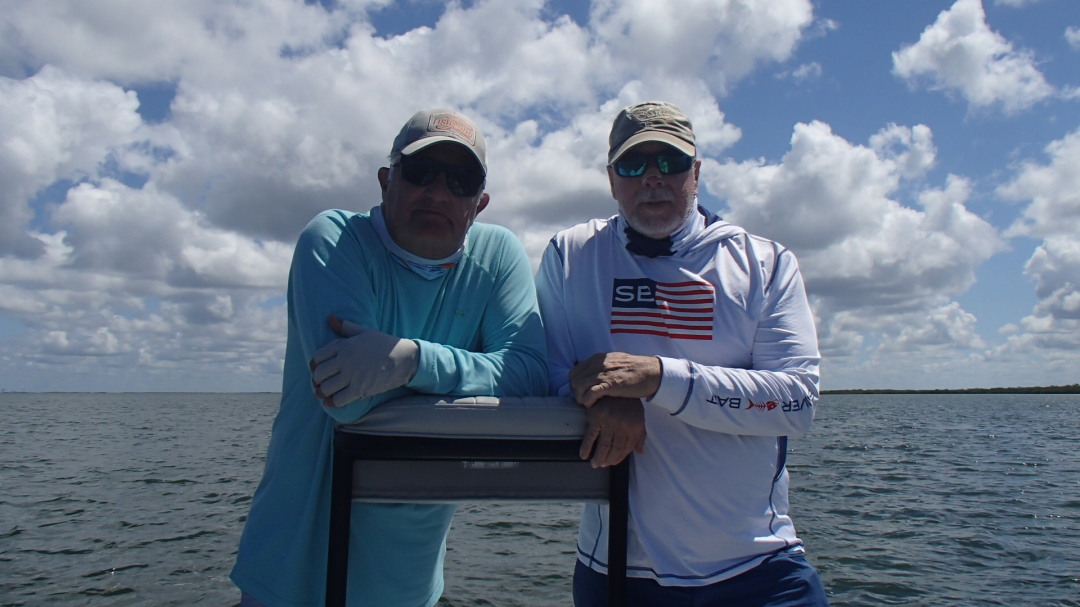 My buddy Larry and I, chasing Tarpon Homosassa