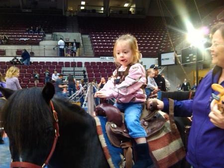 margaret on the pony.  didnt want to get off