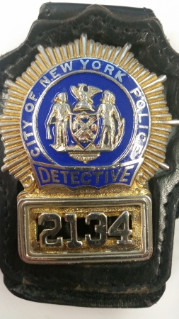 My Detective Gold shield.