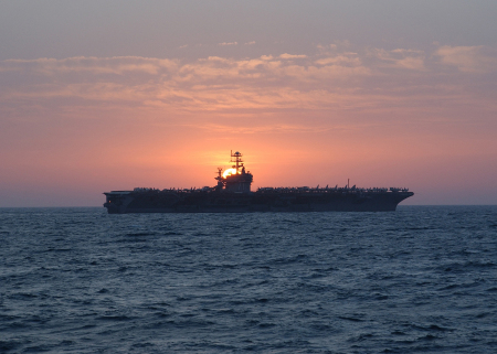 Sun sets on USS Theodore Roosevelt Med Sea