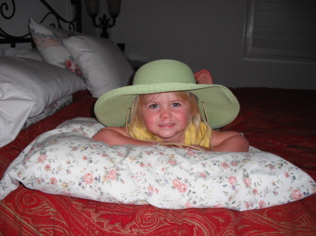 My Grandaughter, Rowan Faith wearing my gardening hat.
