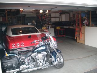 My 65 Impala and my Harley 2002 in my garage 
