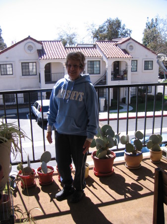 Suzanne on deck of condo