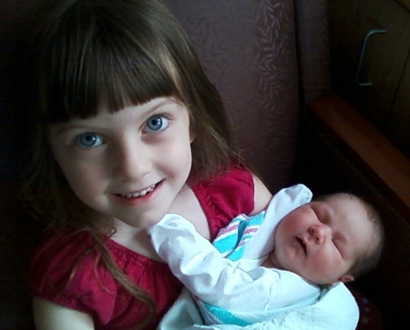 Big sister Mackenzie  w/ Scarlet - 1 day old