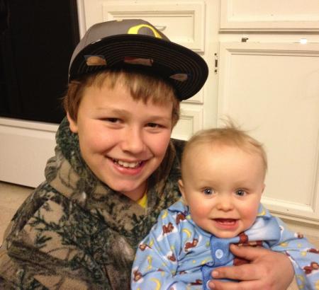 Cody with baby Tyson at his house