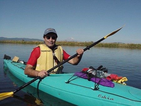 kayak man Mount Lassen in the background