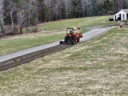 Grading the driveway.