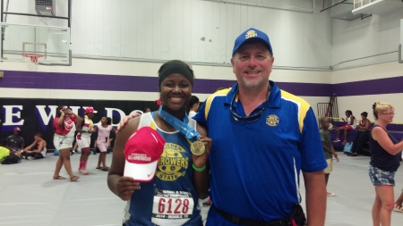 Coach Curry with his first national champion Emelda