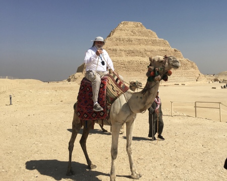 Riding a camel at Sakkara in Egypt