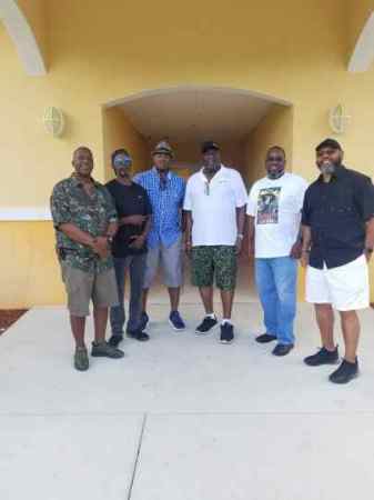 The South Florida Wildcat Crew with Coach L.L.