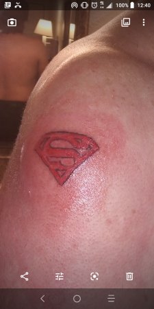 I am Superman! My wife tattooed me!