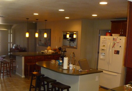 from sun room through kitchen into the living