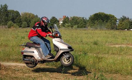 Flying scooter piloted by Barry