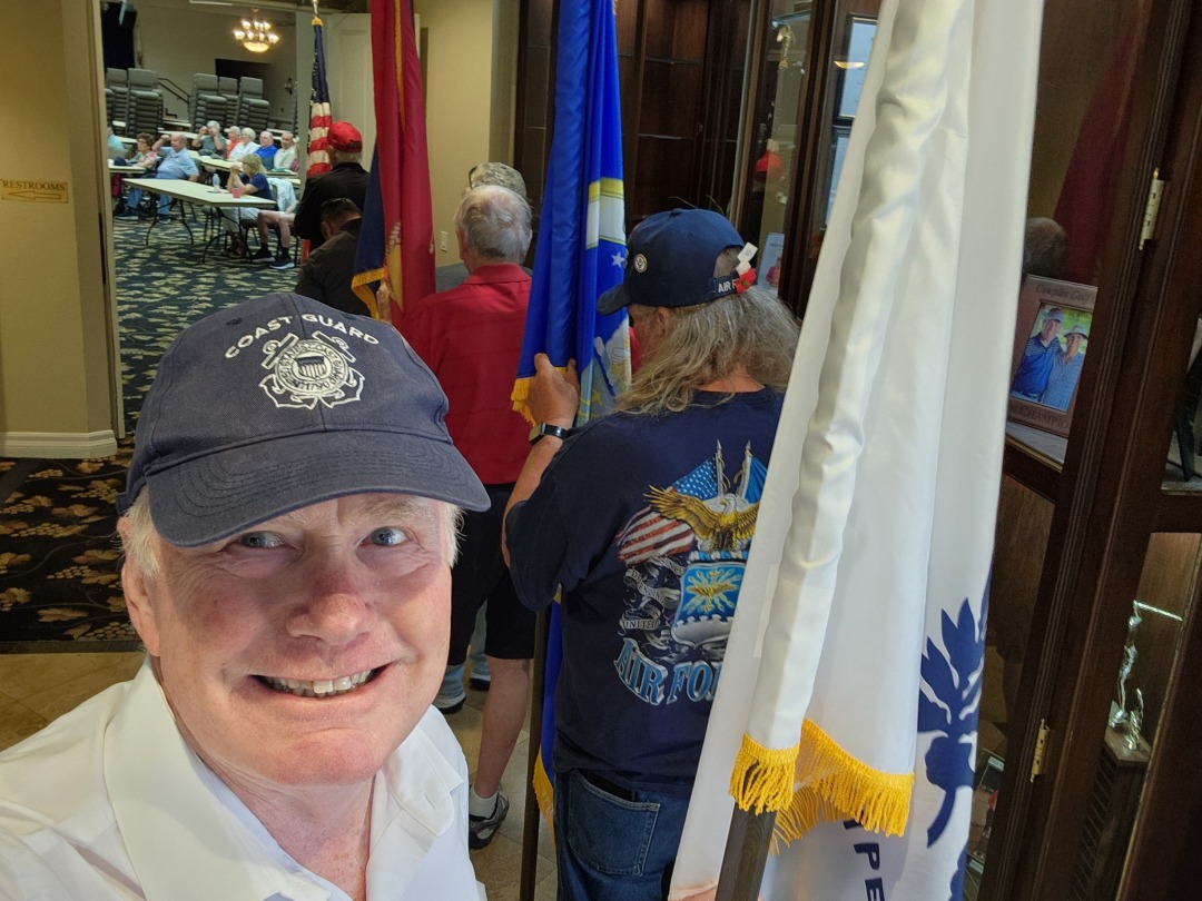 Trooping the Coast Guard colors.