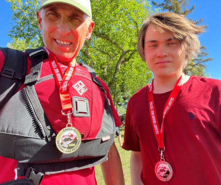 with son Scott; dragonboat medals 2023