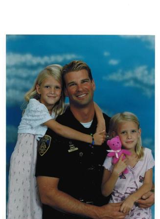 SWAT trading card photo with daughters M&M