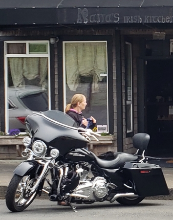 My two favorite girls my wife Judy & my Harley